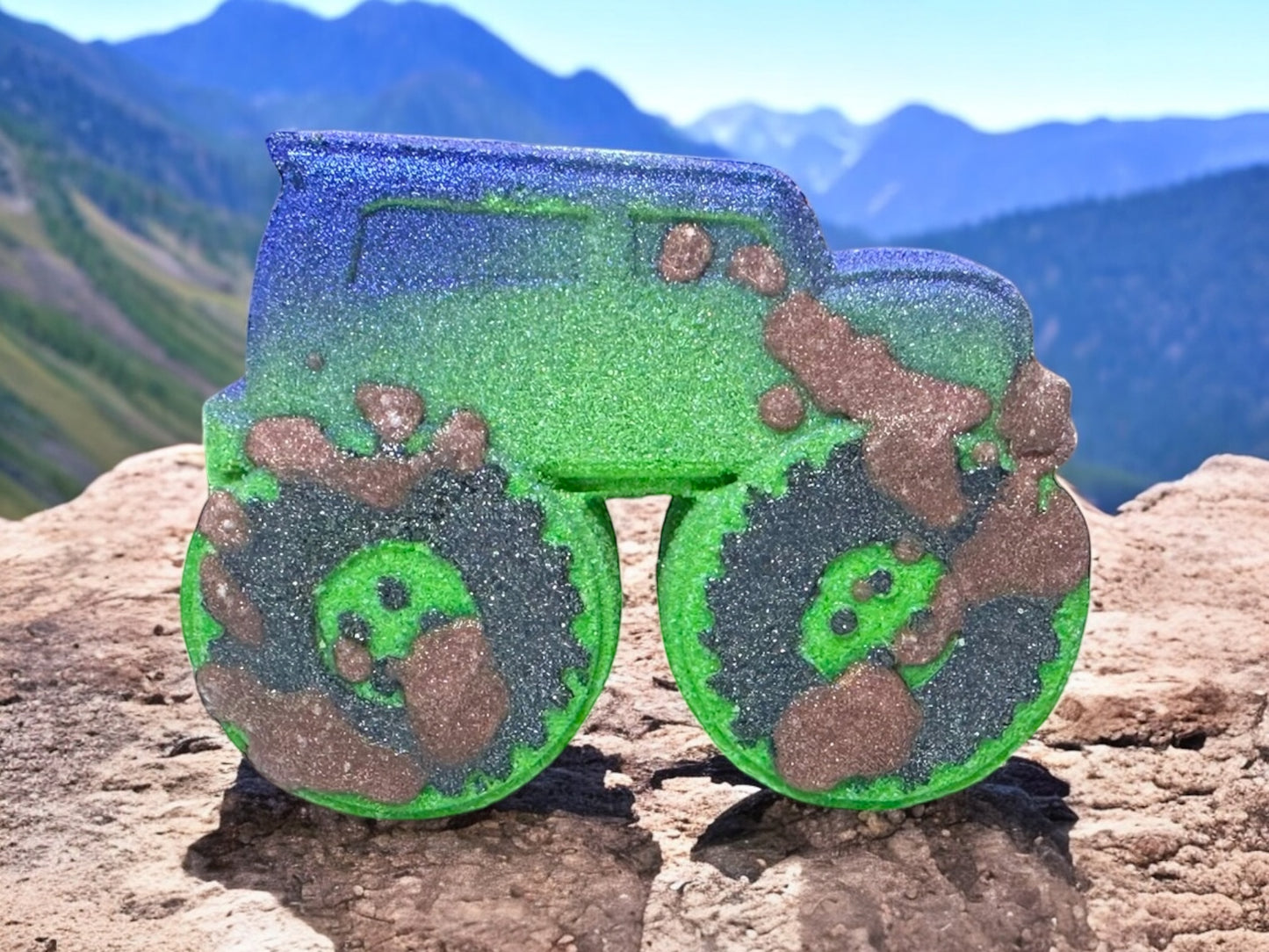 Muddy Monster Truck Bath Bomb – Splash into Muddy Mayhem!
Rev your engines—bath time is about to get wild! Our Muddy Monster Truck Bath Bomb is hand-painted with monster-sized detail and finished with a decadent cocoa butter "mud" drizzle for extra moisturizing fun.