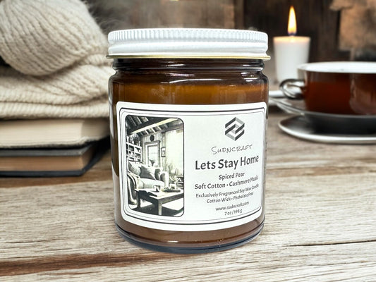Create a cozy, inviting atmosphere with our Warm & Cozy Candle Collection! Hand-poured with a custom soy wax blend and cotton wicks, these candles offer a clean, long-lasting burn with rich, comforting scents. Start with our first release, Let’s Stay Home, a warm and inviting blend of spiced pear, soft cotton, and cashmere musk. More scents coming soon—stay tuned!"