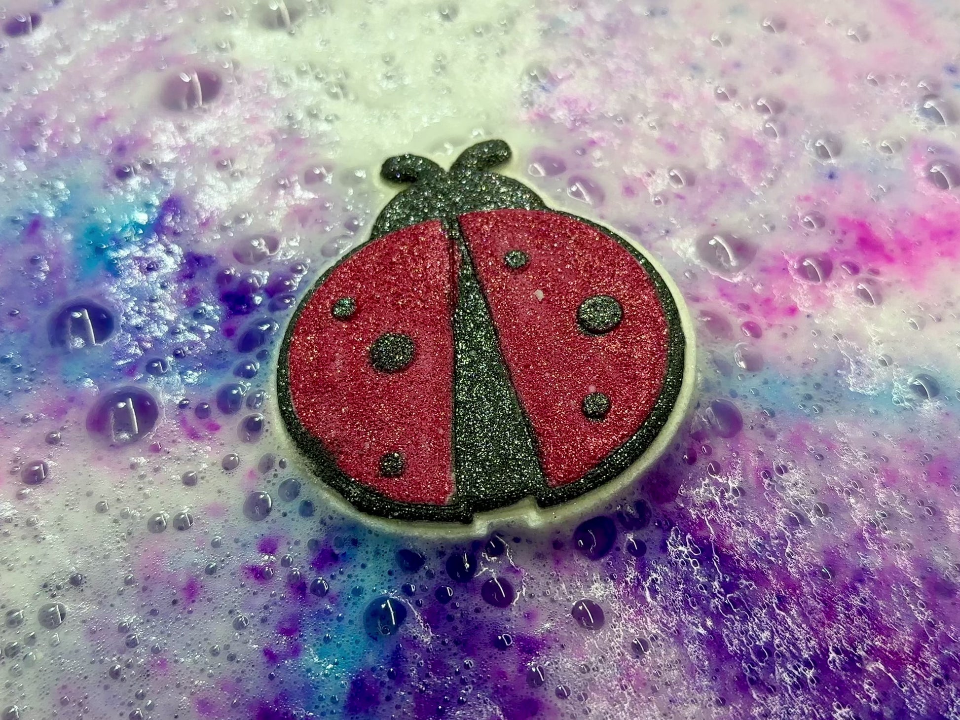 Lady Bug Bath Bomb in Fizzy Action