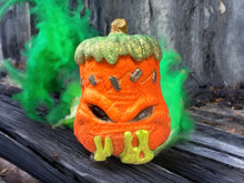 Load image into Gallery viewer, Haunted Pumpkin Bath Bomb, Hand Painted with Colors Inside
