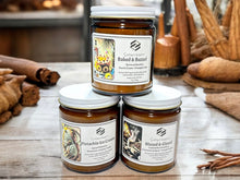 Load image into Gallery viewer, Fill your home with the inviting aroma of fresh-baked treats with our Sweet &amp; Spice Candle Collection! Featuring four indulgent scents, these luxury soy candles are made with cotton wicks for a clean, even burn and phthalate-free fragrance blends to create a warm and cozy atmosphere. Whether you&#39;re drawn to toasted marshmallow and cinnamon spice, rich buttercream vanilla, or the deep warmth of buttered bourbon, these handcrafted candles are the perfect way to add a little sweetness and spice to your space
