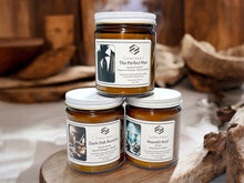 Load image into Gallery viewer, Immerse yourself in deep, grounding aromas with our Woods &amp; Earth Candle Collection—a hand-poured selection of luxury soy candles infused with phthalate-free fragrance blends. Each candle delivers a rich, masculine scent throw, perfect for those who love warm woods, earthy depth, and a hint of spice. Whether it’s the bold confidence of The Perfect Man, the timeless elegance of Dark Oak Reserve, or the mysterious freshness of Moonlit Reef, this collection offers an unforgettable olfactory experience.
